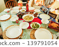 A warm, home-cooked meal shared with family and friends. 139791054