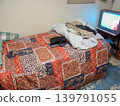 A bedroom full of everyday life and a relaxing time. 139791055