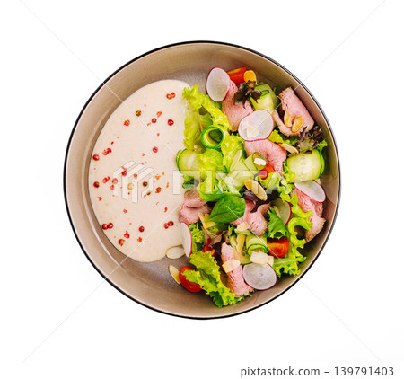 Roast beef salad with creamy sauce and vegetables for a healthy meal option at lunch time 139791403