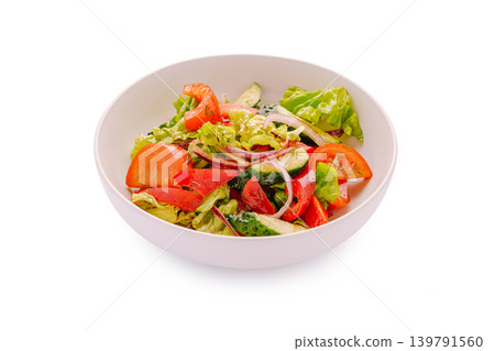 Fresh salad with tomatoes, cucumbers, and lettuce served in a bowl Fresh salad with tomatoes, cucumbers, and lettuce served in a bowl 139791560