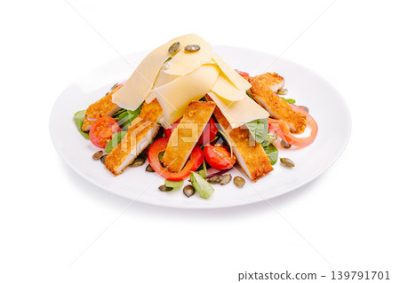 Healthy salad with breaded chicken and cheese on a white plate Healthy salad with breaded chicken and cheese on a white plate 139791701