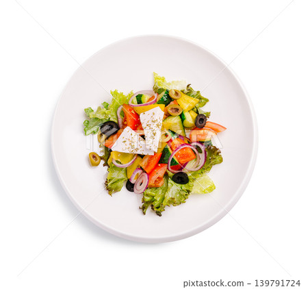 Fresh salad with vegetables and cheese served on a plate Fresh salad with vegetables and cheese served on a plate 139791724