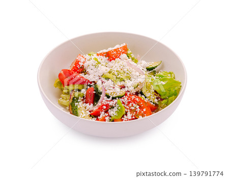 Fresh salad with vegetables and cheese in a white bowl on a plain background Fresh salad with vegetables and cheese in a white bowl on a plain background 139791774
