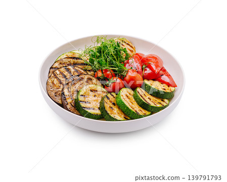 Grilled vegetables served in a bowl with garnish on the side Grilled vegetables served in a bowl with garnish on the side 139791793