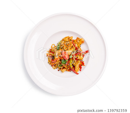 Chicken stir fry with mixed vegetables served on a white plate Chicken stir fry with mixed vegetables served on a white plate 139792359