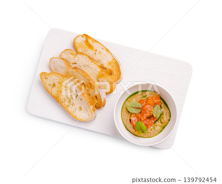 Gourmet liver pate with toasted baguette on a white plate Gourmet liver pate with toasted baguette on a white plate 139792454
