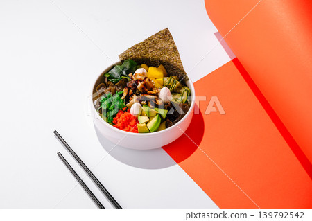 Poke bowl with eel avocado and seaweed salad Poke bowl with eel avocado and seaweed salad 139792542