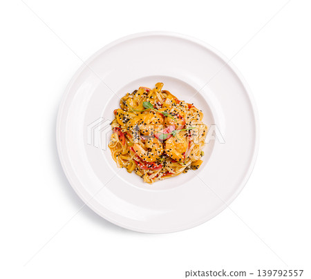 Shrimp pasta with sesame seeds on white plate Shrimp pasta with sesame seeds on white plate 139792557