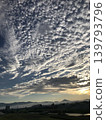 Clouds illuminated by the sunset 139793796