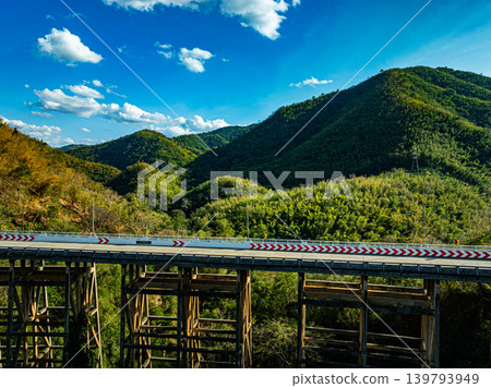 Famous Huai Tong Bridge with Foggy Mountain Background Famous Huai Tong Bridge with Foggy Mountain Background 139793949