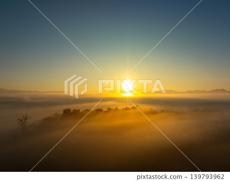 Aerial view scenery sunrise above the sea of mist in front Thi Lor Su waterfall. Aerial view scenery sunrise above the sea of mist in front Thi Lor Su waterfall. 139793962