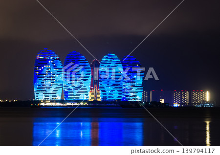 Night view of buildings on Phoenix island in Sanya, Hainan Night view of buildings on Phoenix island in Sanya, Hainan 139794117
