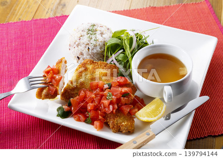 Milanese cutlet lifted with a fork - Western-style lunch set Milanese cutlet lifted with a fork - Western-style lunch set 139794144