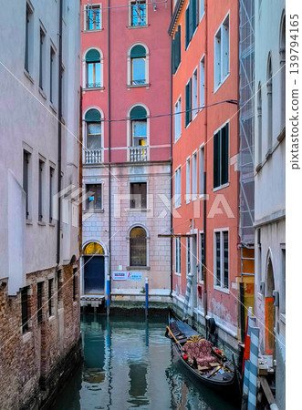 The streets of Venice: small canals and empty gondolas. The streets of Venice: small canals and empty gondolas. 139794165