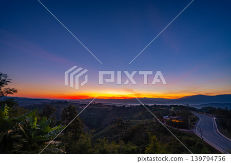 Aerial view of Golden Sky Over Nan Dramatic Ridge Road Aerial view of Golden Sky Over Nan Dramatic Ridge Road 139794756