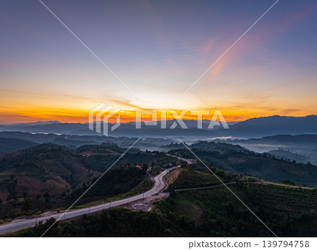 Aerial view of Golden Sky Over Nan Dramatic Ridge Road Aerial view of Golden Sky Over Nan Dramatic Ridge Road 139794758