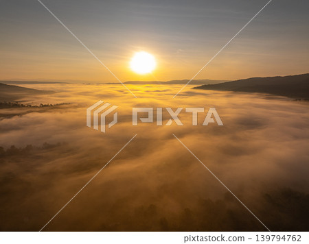 Aerial view of Golden Sky Over Nan Dramatic Ridge Road 139794762