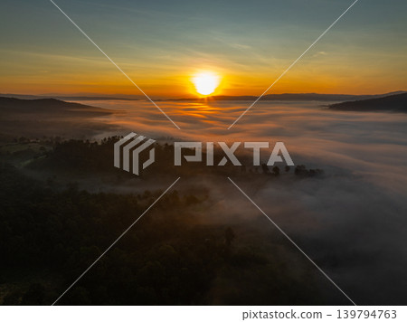Aerial view of Golden Sky Over Nan Dramatic Ridge Road 139794763