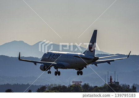 Airplane landing at Sendai Airport in the afternoon, Natori City, Miyagi Prefecture Airplane landing at Sendai Airport in the afternoon, Natori City, Miyagi Prefecture 139795183