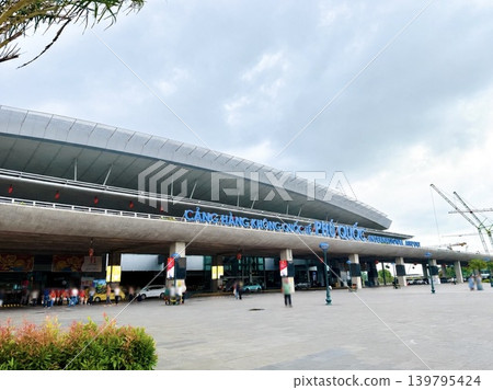 Exterior view of the terminal at Phu Quoc International Airport in Vietnam. Exterior view of the terminal at Phu Quoc International Airport in Vietnam. 139795424