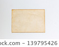 Blank aged paper on white background, top view. Vintage yellowed paper texture flat lay, old antique document background with copy space. 139795426