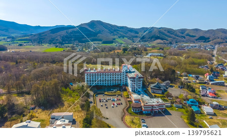 April 26 2026 Onumakoen Town Aerial With Hotel And Mountains April 26 2026 Onumakoen Town Aerial With Hotel And Mountains 139795621