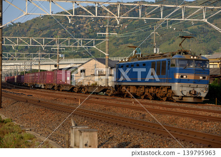 EF510-512 container freight train running on the Tokaido Line EF510-512 container freight train running on the Tokaido Line 139795963
