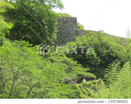 The stone walls of Oka Castle Ruins, a nationally designated historical site and one of Japan's 100 Famous Castles, located in Taketa City, Oita Prefecture, known for Rentaro Taki's song "Kojo no Tsuki" (The Moon over the Ruined Castle). The stone walls of Oka Castle Ruins, a nationally designated historical site and one of Japan's 100 Famous Castles, located in Taketa City, Oita Prefecture, known for Rentaro Taki's song "Kojo no Tsuki" (The Moon over the Ruined Castle). 139796805