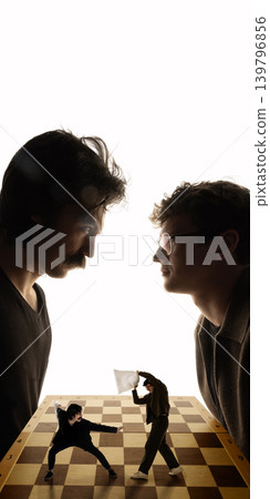 Business rivals confronting each other over miniature chess board scene Business rivals confronting each other over miniature chess board scene 139796856