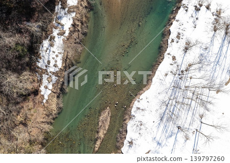 An aerial photograph showing a snowy landscape along the Tedori River in Hakusan City, Ishikawa Prefecture. An aerial photograph showing a snowy landscape along the Tedori River in Hakusan City, Ishikawa Prefecture. 139797260