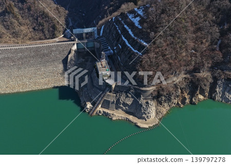 Aerial photograph of the Tedori Lake (Tedori River Dam) embankment and water intake facilities in Hakusan City, Ishikawa Prefecture. Aerial photograph of the Tedori Lake (Tedori River Dam) embankment and water intake facilities in Hakusan City, Ishikawa Prefecture. 139797278