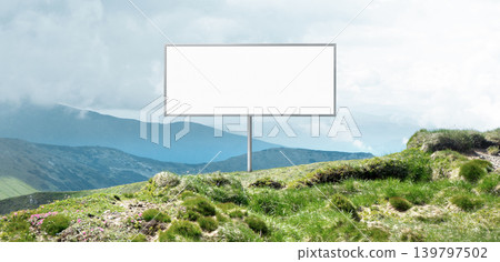 Clean billboard mockup in mountain meadow with bright sky copy space. Clean billboard mockup in mountain meadow with bright sky copy space. 139797502