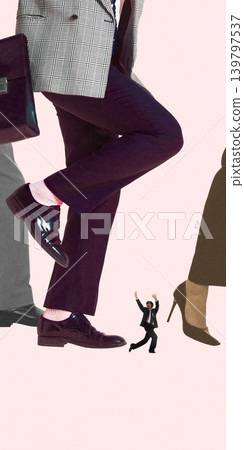 Tiny businessman under giant walking legs concept of overwhelm and corporate pressure Tiny businessman under giant walking legs concept of overwhelm and corporate pressure 139797537