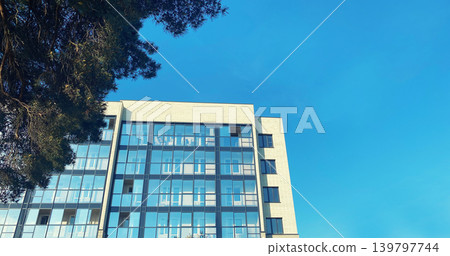 Architecture and real estate, modern residential apartment building with large panoramic windows Architecture and real estate, modern residential apartment building with large panoramic windows 139797744