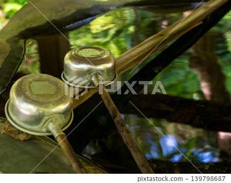 A ladle placed in the chozuya of a shrine A ladle placed in the chozuya of a shrine 139798687