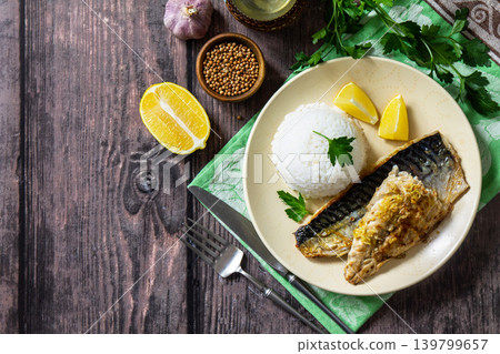 Grilled baked mackerel in a ginger mustard honey sauce, served with rice on a rustic table. View from above. Copy space. 139799657