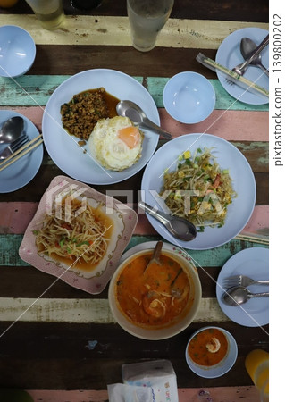 Thailand Street Food Spread on Colorful Table Thailand Street Food Spread on Colorful Table 139800202