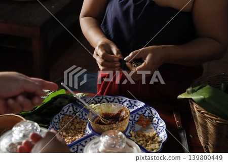 Traditional Food Preparation with Hands and Ingredients Traditional Food Preparation with Hands and Ingredients 139800449
