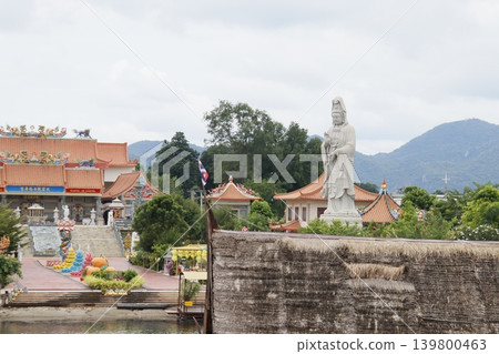 Temple Complex with Statue and Traditional Architecture Temple Complex with Statue and Traditional Architecture 139800463