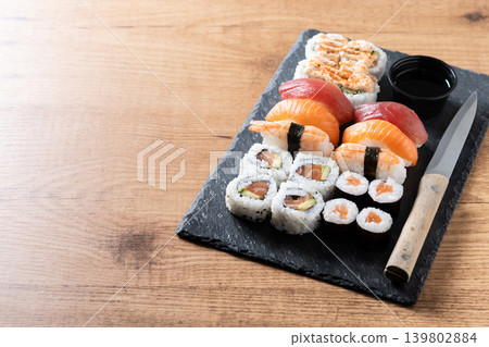 Fresh sushi assortment with salmon maki and nigiri Fresh sushi assortment with salmon maki and nigiri 139802884