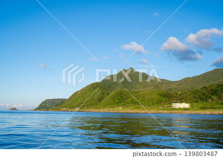 Taiwan, Lanyu - A panoramic view of Dongqing Bay in 2026, Dalu tribe's traditional pin boat station on Etuushi Beach Taiwan, Lanyu - A panoramic view of Dongqing Bay in 2026, Dalu tribe's traditional pin boat station on Etuushi Beach 139803487