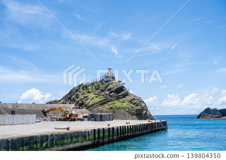 Taiwan Taidong Lanyu scenery: famous landmarks of Kaiyuan Port, white light tower, reef rock scenery, walking road, and panoramic view of the Ullan Pacific Ocean Taiwan Taidong Lanyu scenery: famous landmarks of Kaiyuan Port, white light tower, reef rock scenery, walking road, and panoramic view of the Ullan Pacific Ocean 139804350