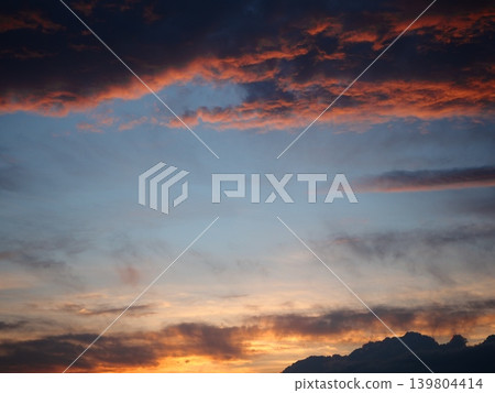 A cloud that turns red in the sunset A cloud that turns red in the sunset 139804414