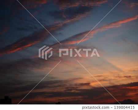 A cloud that turns red in the sunset A cloud that turns red in the sunset 139804415