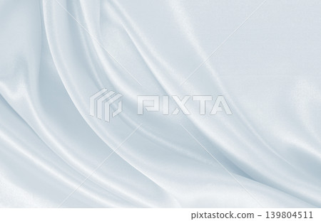 Smooth elegant grey silk or satin luxury cloth as wedding background. Luxurious background design Smooth elegant grey silk or satin luxury cloth as wedding background. Luxurious background design 139804511