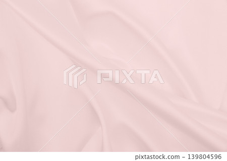 Smooth elegant pink silk or satin texture as wedding background. Luxurious background design Smooth elegant pink silk or satin texture as wedding background. Luxurious background design 139804596