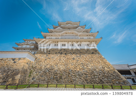 Japan: Himeji Castle in Hyogo Prefecture under a blue sky Japan: Himeji Castle in Hyogo Prefecture under a blue sky 139804978