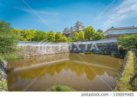 Japan: Himeji Castle in Hyogo Prefecture under a blue sky Japan: Himeji Castle in Hyogo Prefecture under a blue sky 139804980