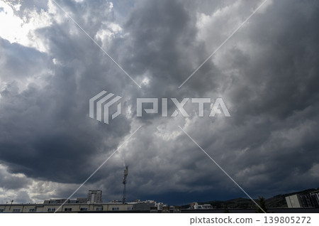 Overcast sky with dense rain and cumulonimbus clouds Overcast sky with dense rain and cumulonimbus clouds 139805272