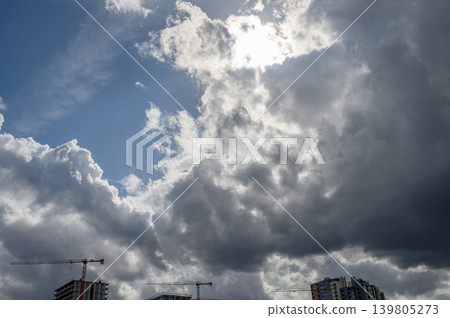 Sunlight breaking through cumulonimbus clouds Sunlight breaking through cumulonimbus clouds 139805273